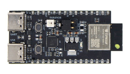 Czarna płytka rozwojowa ESP32-H2 leży na białym tle.
